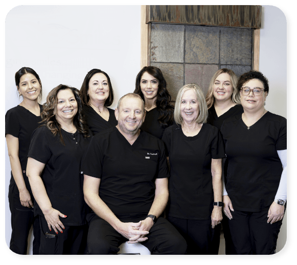 staff smiling together